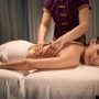 Spa customer sleeping during relaxing classic massage session